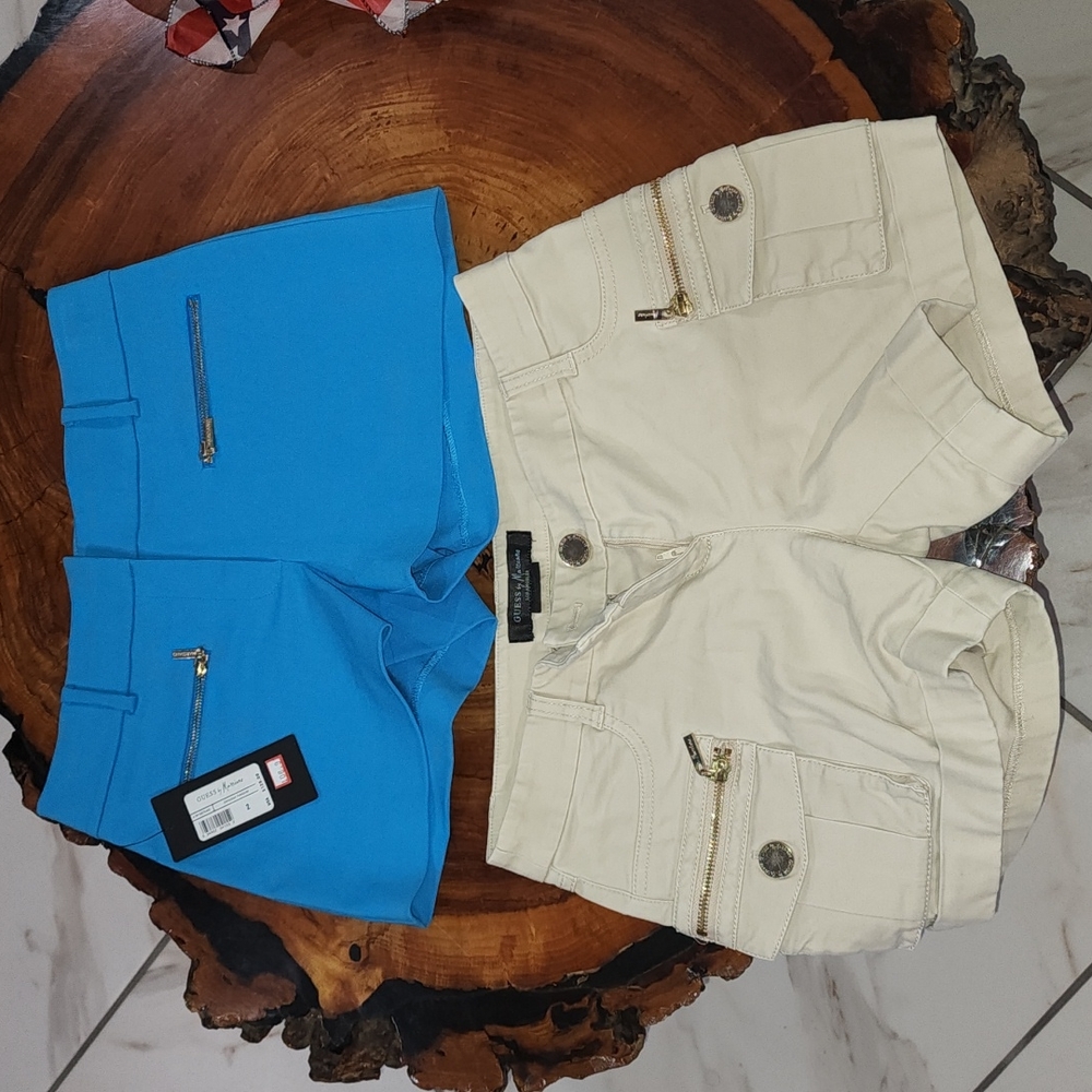 2 shorts blue  it's new never to used  khaky  it's use good condition size 2